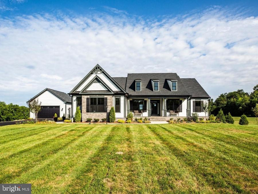 11 Burwell Road Nokesville, VA 20181 - Photo 1 of 26 a front view of a house with a yard