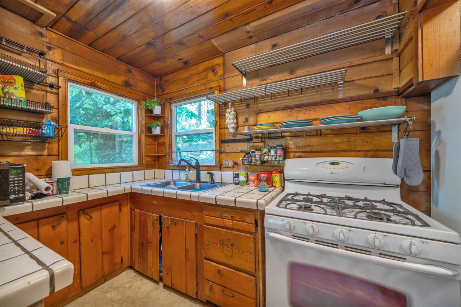 6929 Split Bend Road Pollock Pines, CA 95726 - Photo 11 of 38 a kitchen that has a stove and a sink