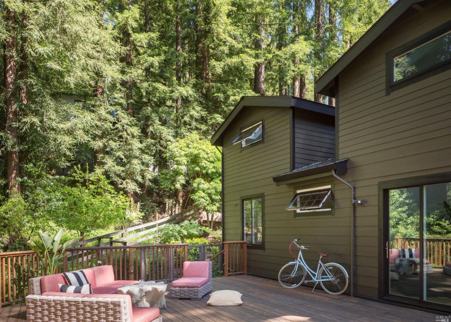 a backyard of a house with seating space