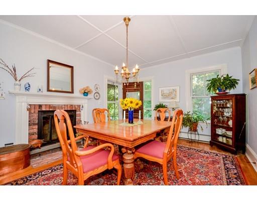 300 Converse Road Marion, MA 02738 - Photo 12 of 35 a view of a dining room with furniture and chandelier
