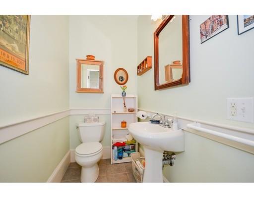 300 Converse Road Marion, MA 02738 - Photo 17 of 35 a bathroom with a sink mirror and toilet