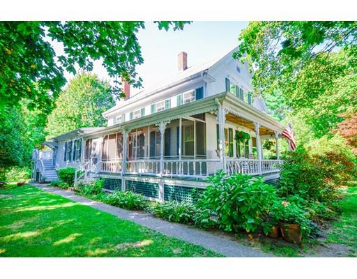 300 Converse Road Marion, MA 02738 - Photo 3 of 35 a front view of a house with a yard and potted plants