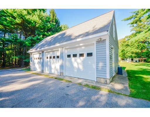 300 Converse Road Marion, MA 02738 - Photo 32 of 35 a view of a house with backyard and a garden