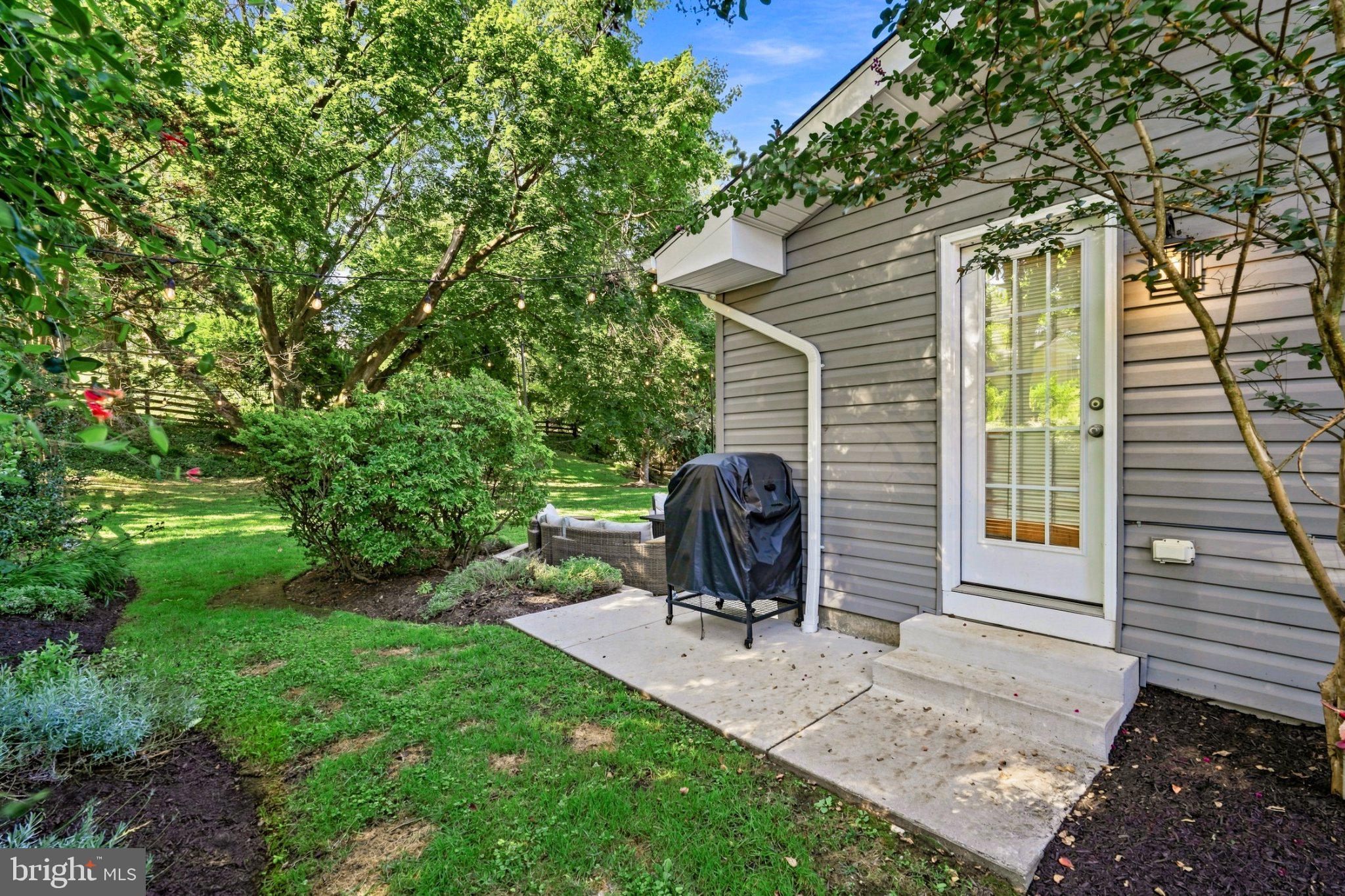Exterior Rear Yard side entrance from the kitchen