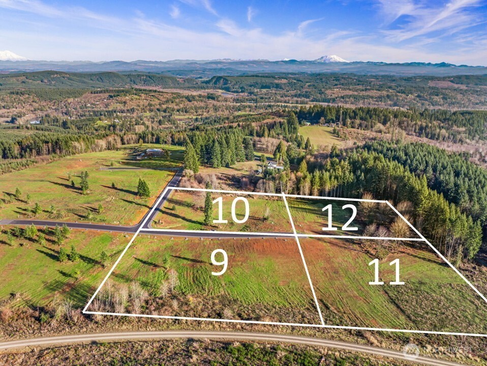 236 Suncrest Drive Castle Rock, WA 98611 - Photo 9 of 9 a view of a swimming pool with a lake view