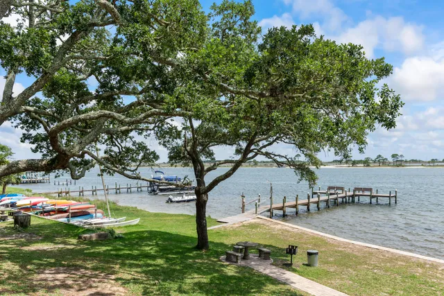 a view of yard with swimming pool and sitting area