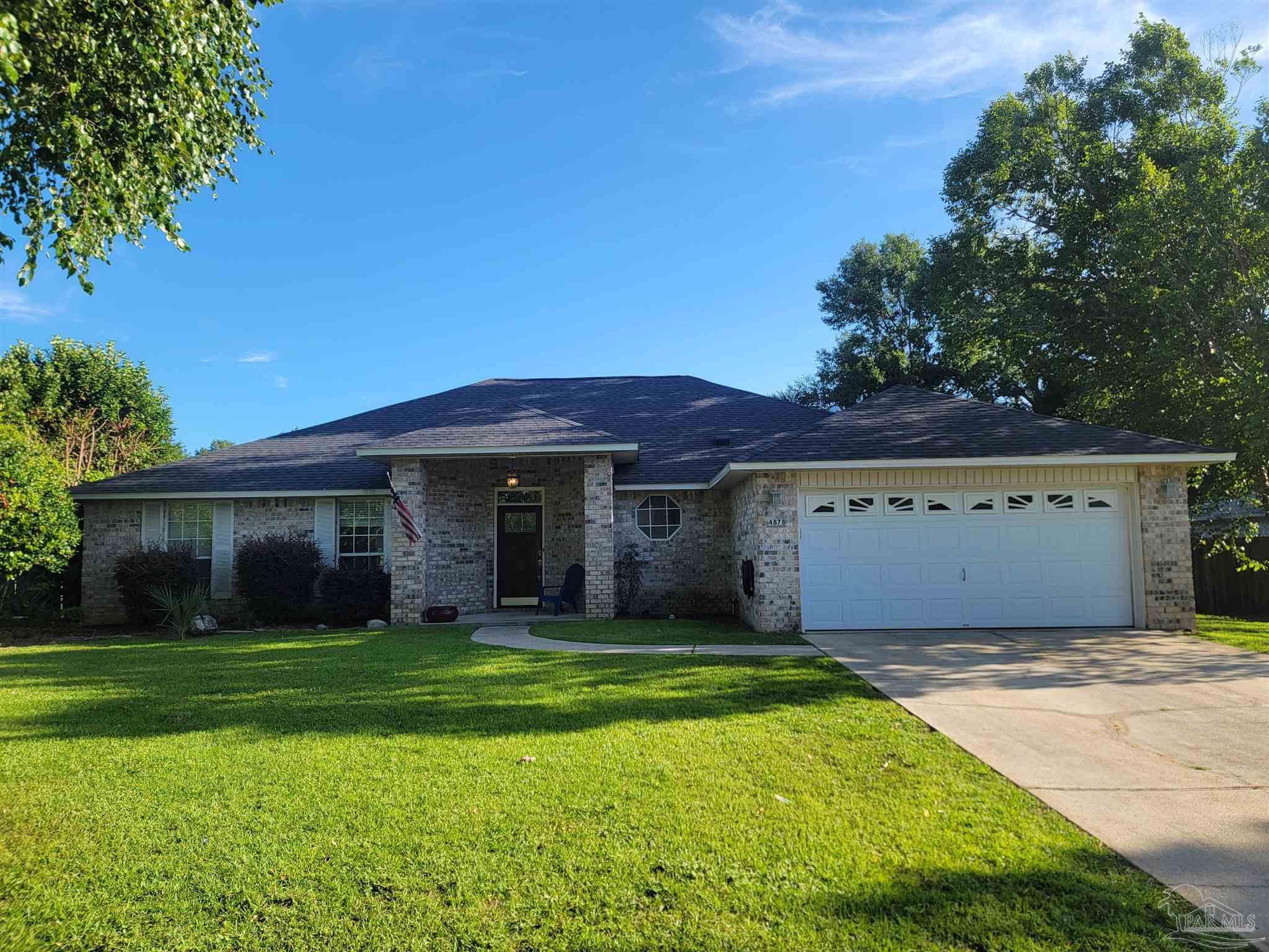 4878 Pineview Ridge Road Pace, FL 32571 - Photo 1 of 20 a view of a house with a yard
