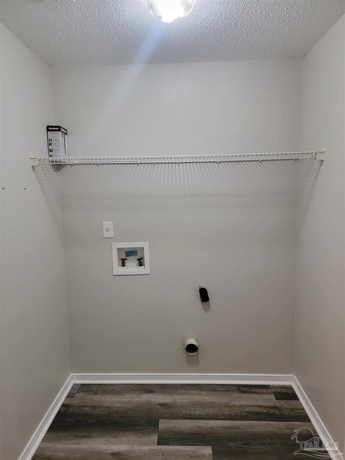 4878 Pineview Ridge Road Pace, FL 32571 - Photo 17 of 20 a view of small space with racks on the wall