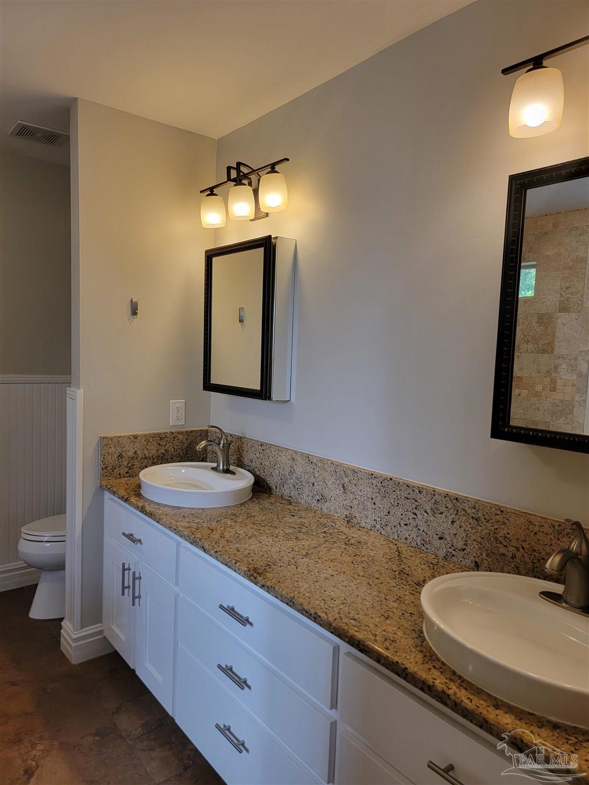 4878 Pineview Ridge Road Pace, FL 32571 - Photo 8 of 20 a bathroom with a granite countertop sink and a mirror
