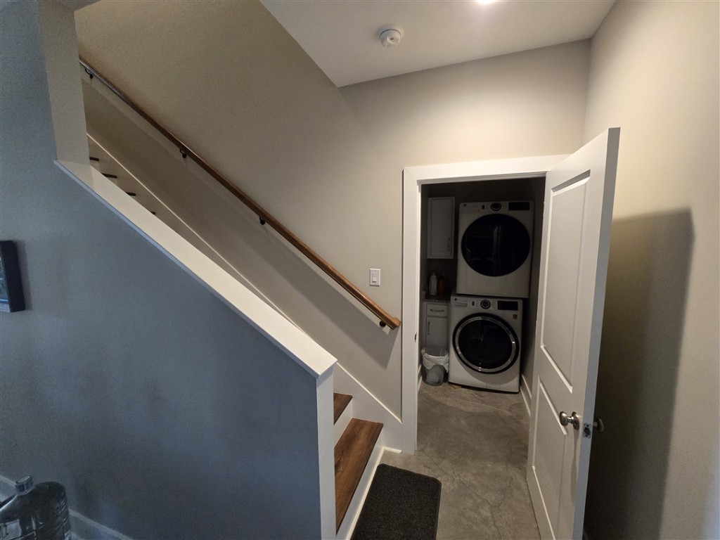 1684 County Road 2234 Lampasas, TX 76550 - Photo 22 of 35 a view of a storage and utility room with dryer and washer