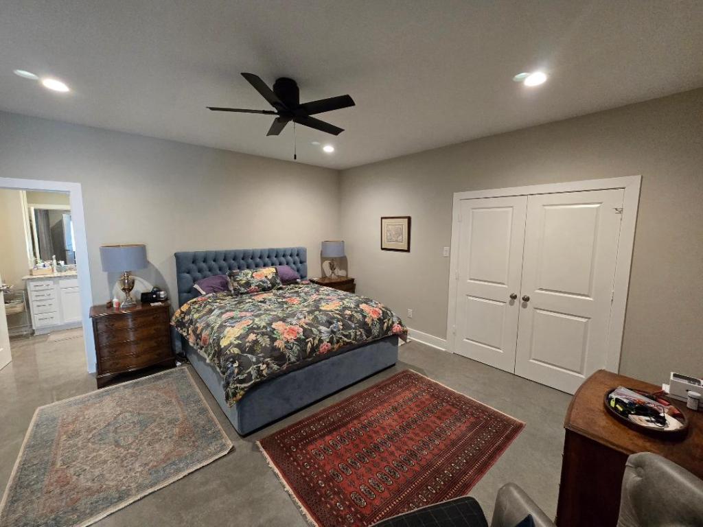 1684 County Road 2234 Lampasas, TX 76550 - Photo 28 of 35 a bedroom with a bed and a lamp on dresser