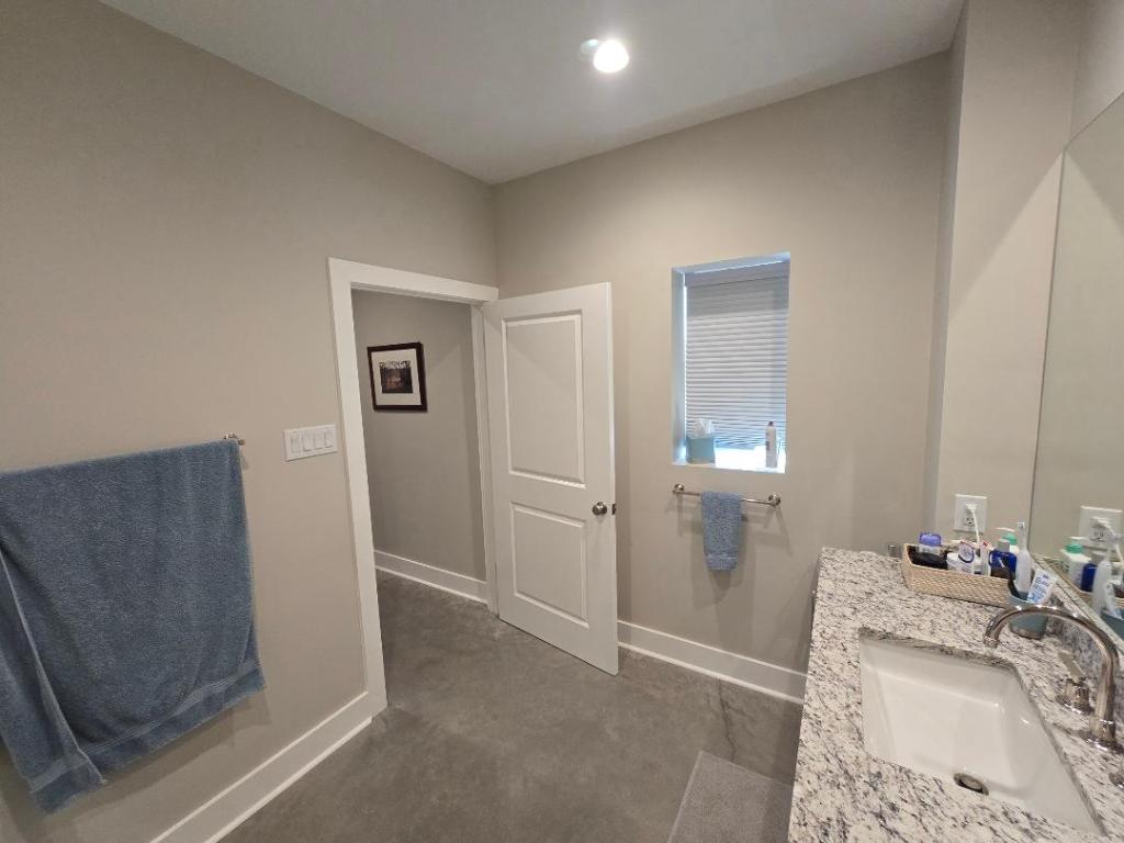 1684 County Road 2234 Lampasas, TX 76550 - Photo 32 of 35 a room with a bed and a mirror