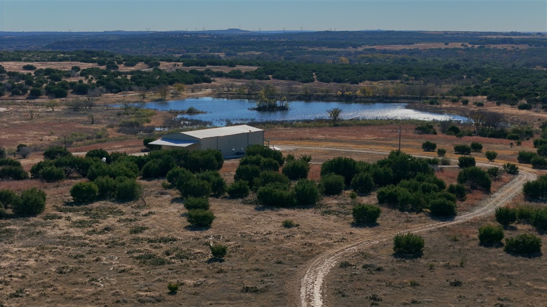 1684 County Road 2234 Lampasas, TX 76550 - Photo 10 of 35 an aerial view of a house with a yard