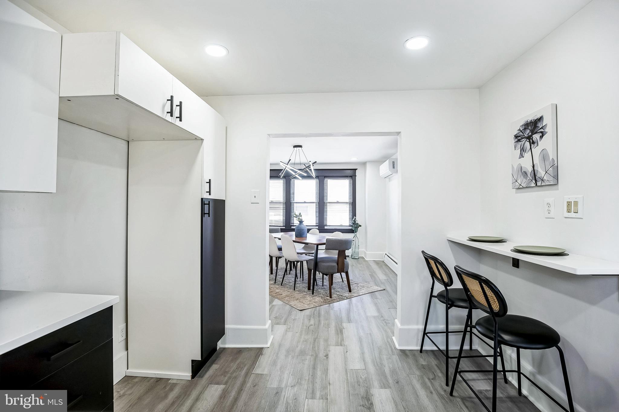24 Cuthbert Road Cinnaminson, NJ 08077 - Photo 16 of 30 a view of a dining room with furniture and wooden floor