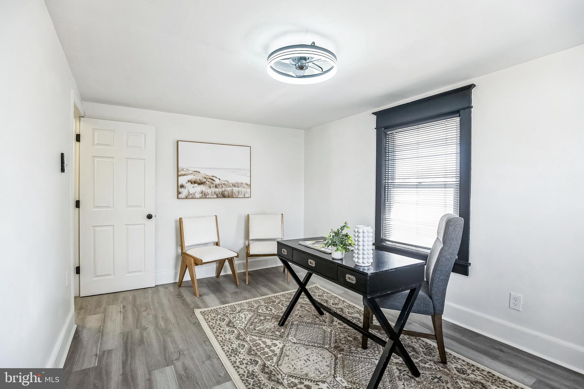 24 Cuthbert Road Cinnaminson, NJ 08077 - Photo 17 of 30 a living room with furniture and a window