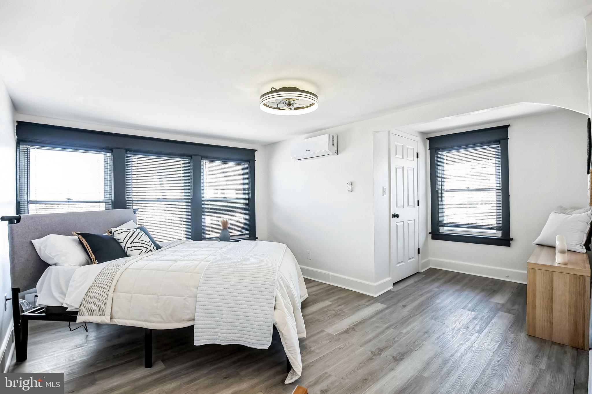 24 Cuthbert Road Cinnaminson, NJ 08077 - Photo 20 of 30 a bedroom with a bed and wooden floor