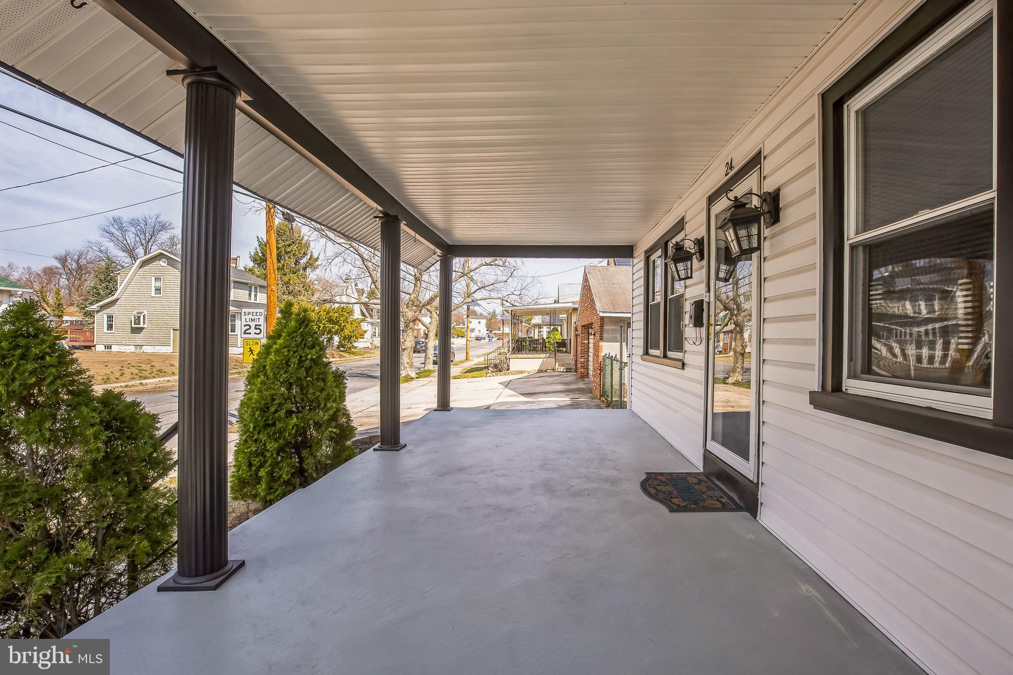 24 Cuthbert Road Cinnaminson, NJ 08077 - Photo 5 of 30 a view of a porch with wooden floor and stairs