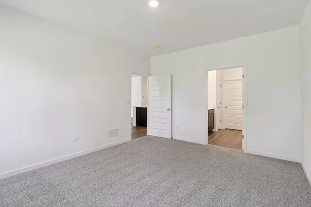 an empty room with an entryway