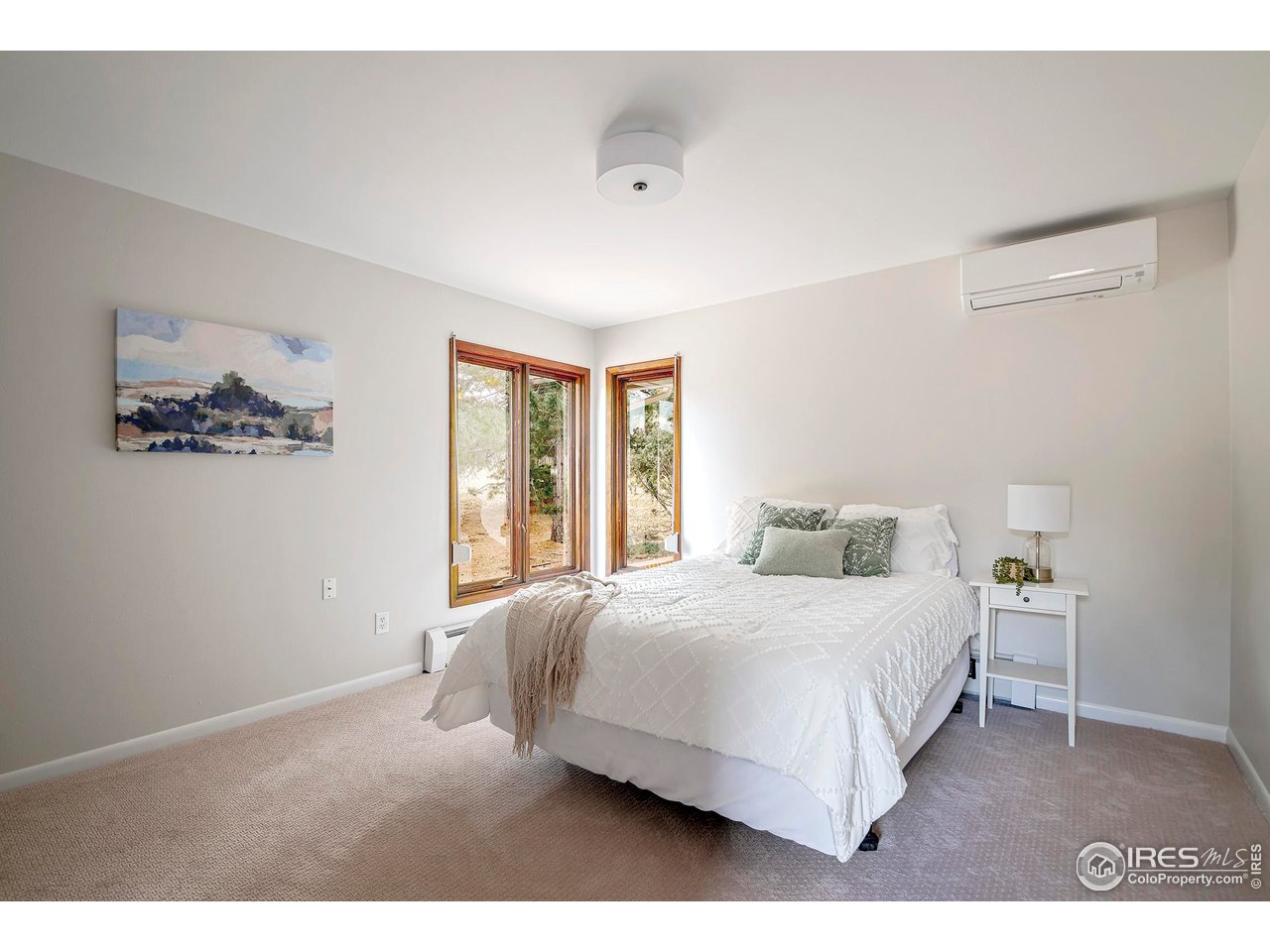 19 Ridge Road Boulder, CO 80303 - Photo 29 of 40 a bedroom with a bed and a window