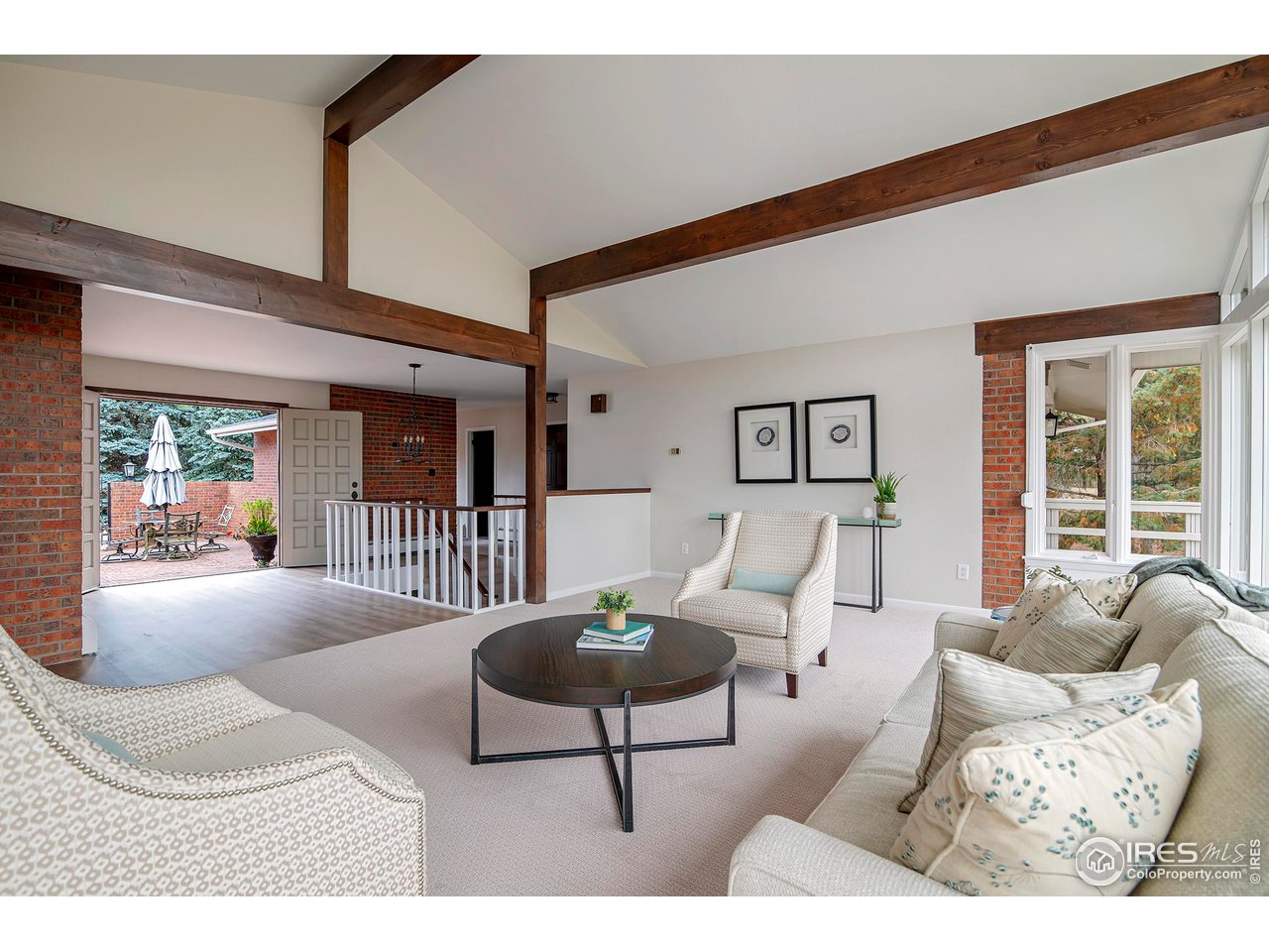 19 Ridge Road Boulder, CO 80303 - Photo 31 of 40 a living room with furniture and a large window