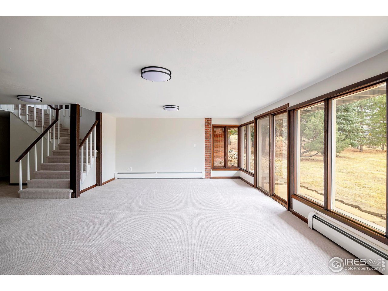 19 Ridge Road Boulder, CO 80303 - Photo 34 of 40 a view of an empty room with stairs