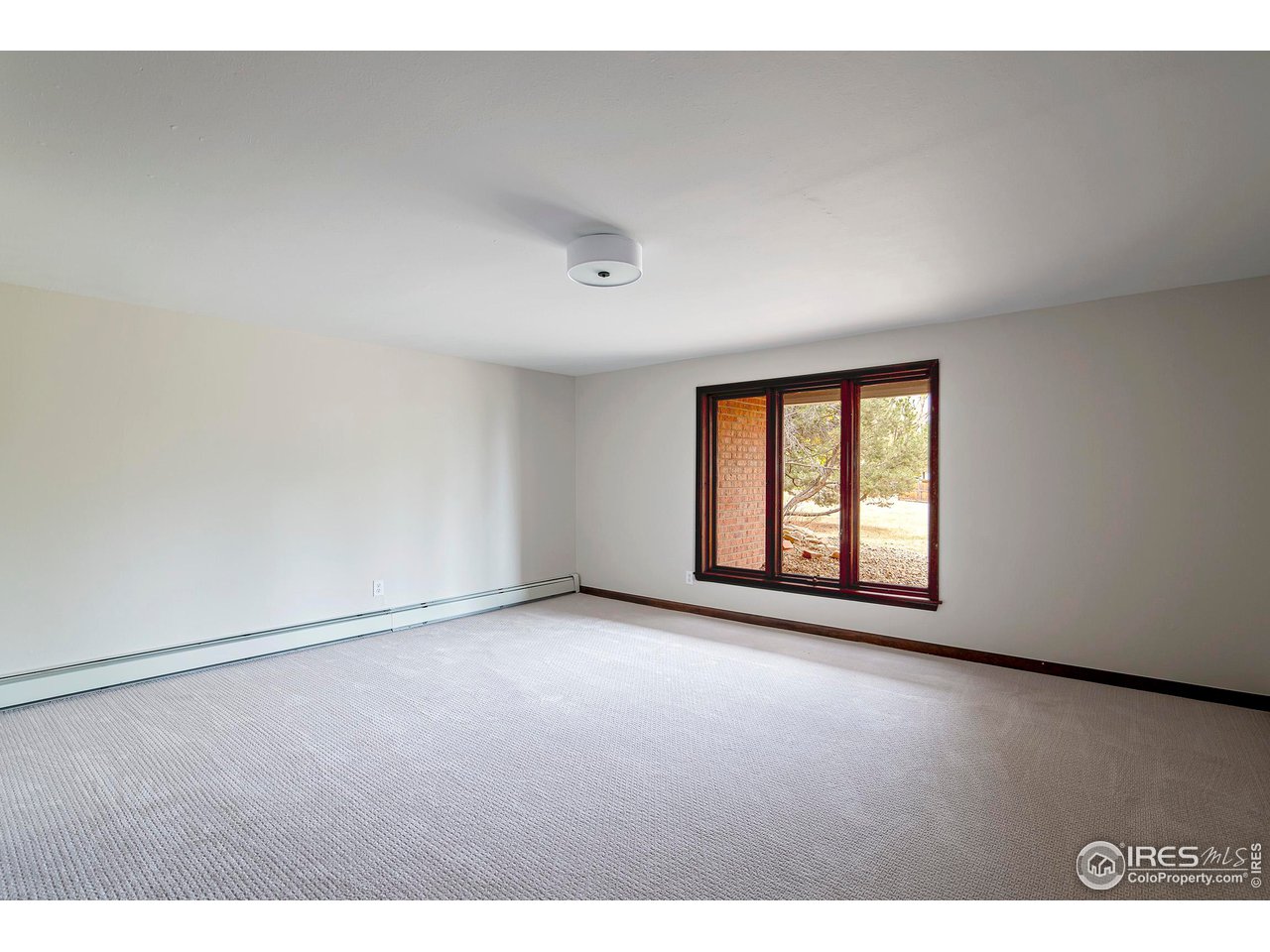 19 Ridge Road Boulder, CO 80303 - Photo 35 of 40 a view of an empty room with a window