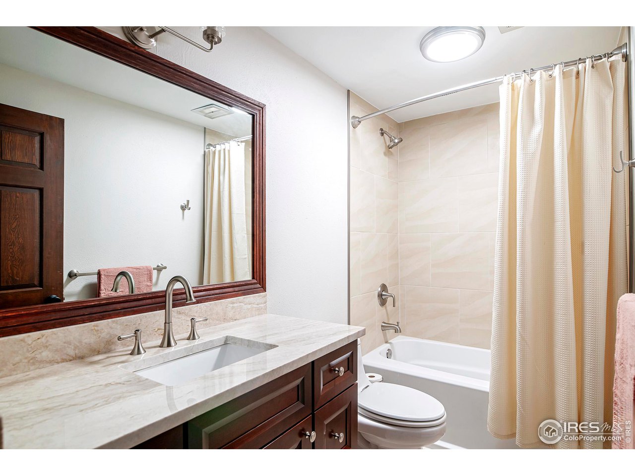 19 Ridge Road Boulder, CO 80303 - Photo 37 of 40 a bathroom with a granite countertop sink toilet and shower