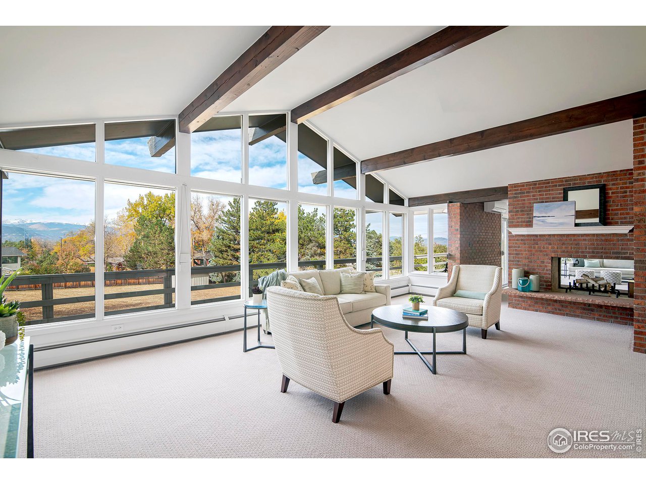 19 Ridge Road Boulder, CO 80303 - Photo 8 of 40 a living room with furniture and a large window