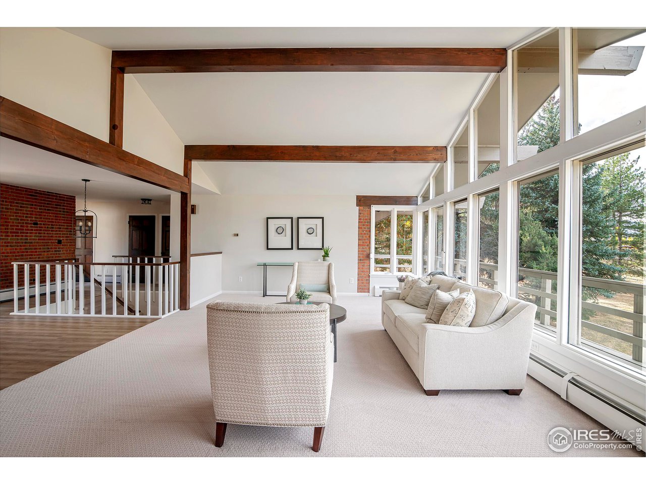 19 Ridge Road Boulder, CO 80303 - Photo 9 of 40 a living room with furniture and a large window