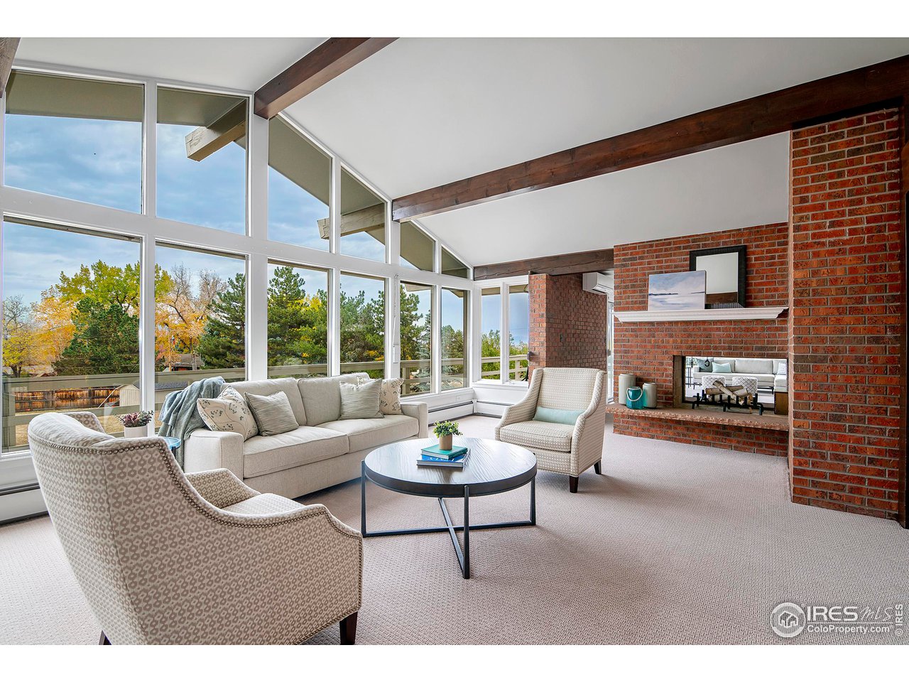 19 Ridge Road Boulder, CO 80303 - Photo 10 of 40 a living room with furniture and a large window