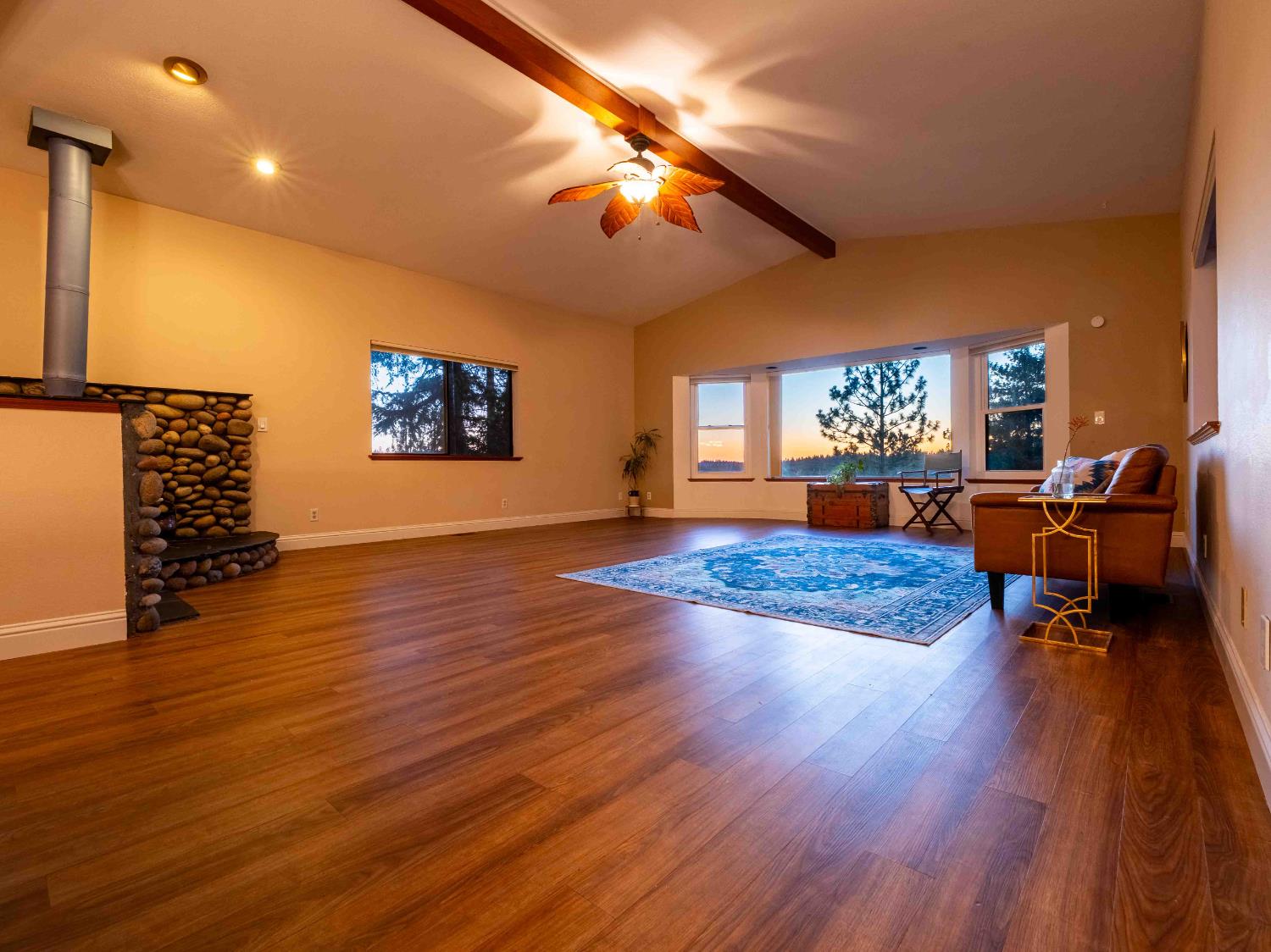11419 Sunset Place Grass Valley, CA 95949 - Photo 36 of 47 a living room with furniture and a wooden floor