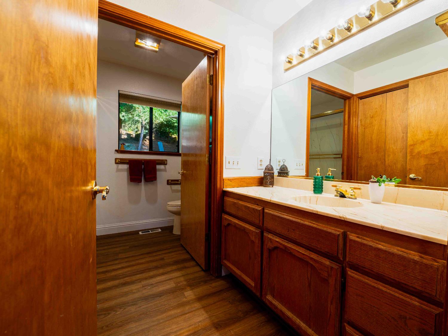 11419 Sunset Place Grass Valley, CA 95949 - Photo 38 of 47 a bathroom with a sink and a mirror