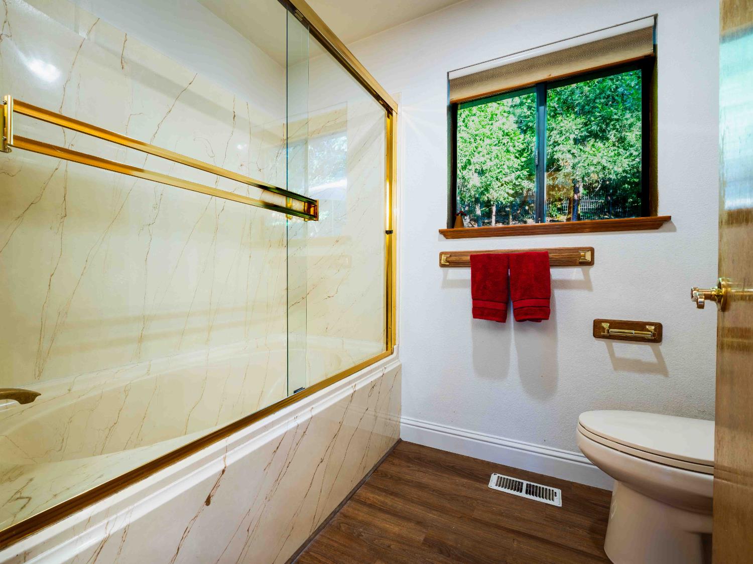 11419 Sunset Place Grass Valley, CA 95949 - Photo 40 of 47 a bathroom with a sink a toilet and shower