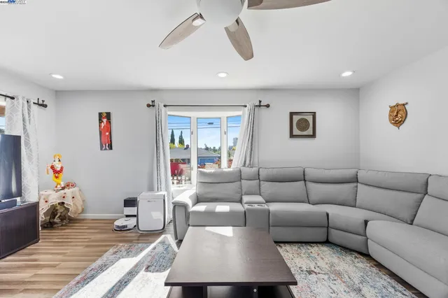 a living room with furniture and a couch