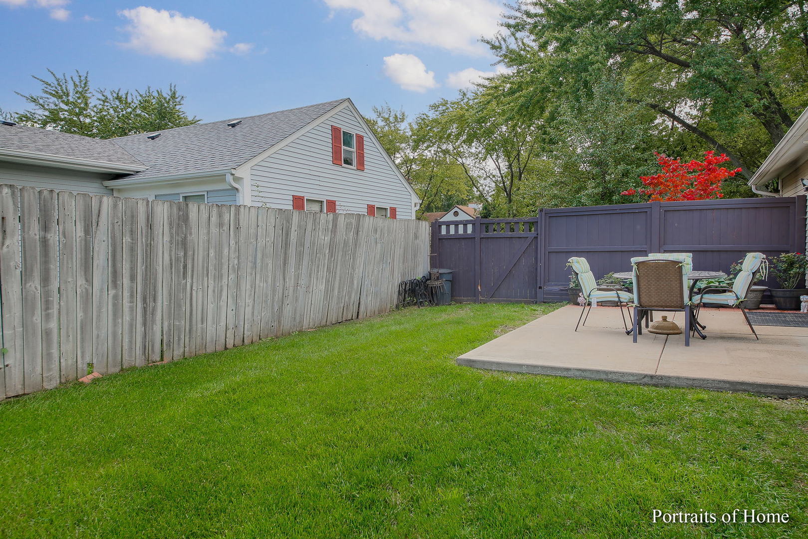 6 Shermead Road Montgomery, IL 60538 - Photo 13 of 25 a view of a backyard with table and chairs and potted plants