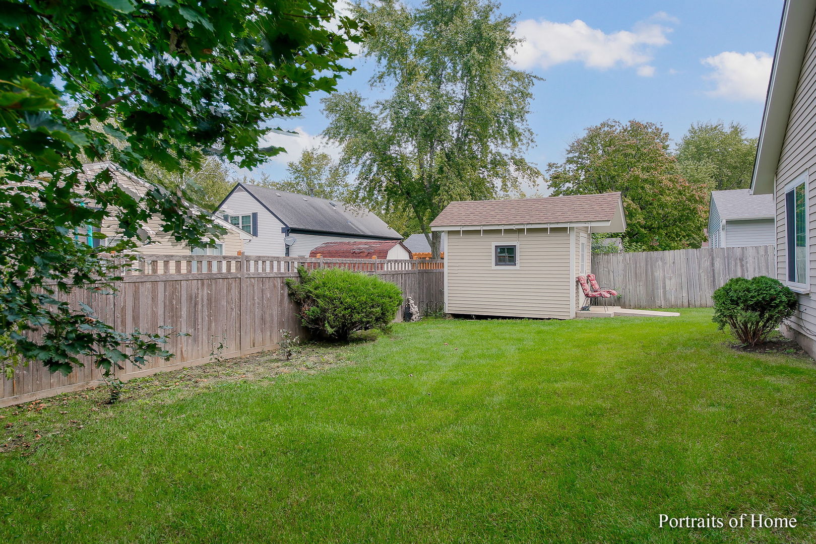 6 Shermead Road Montgomery, IL 60538 - Photo 14 of 25 a view of a backyard with potted plants and large tree