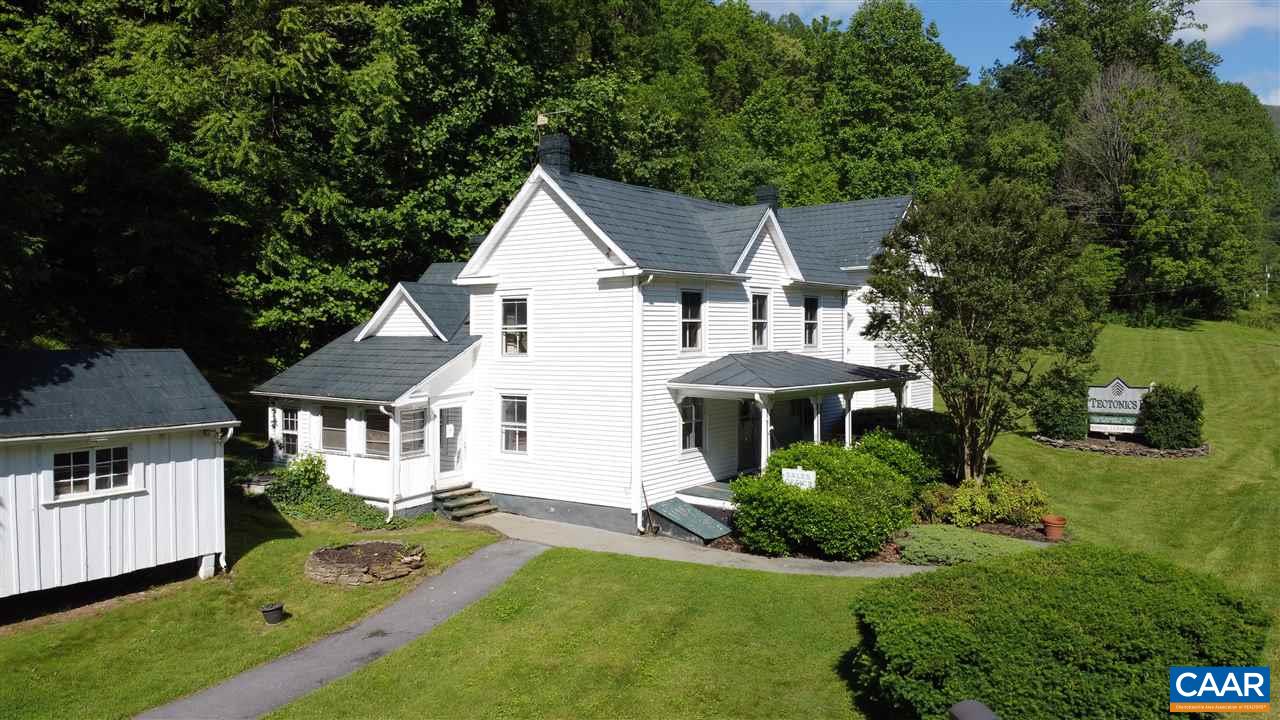 2771 Beech Grove Road Roseland, VA 22967 - Photo 2 of 31 a front view of a house with a yard