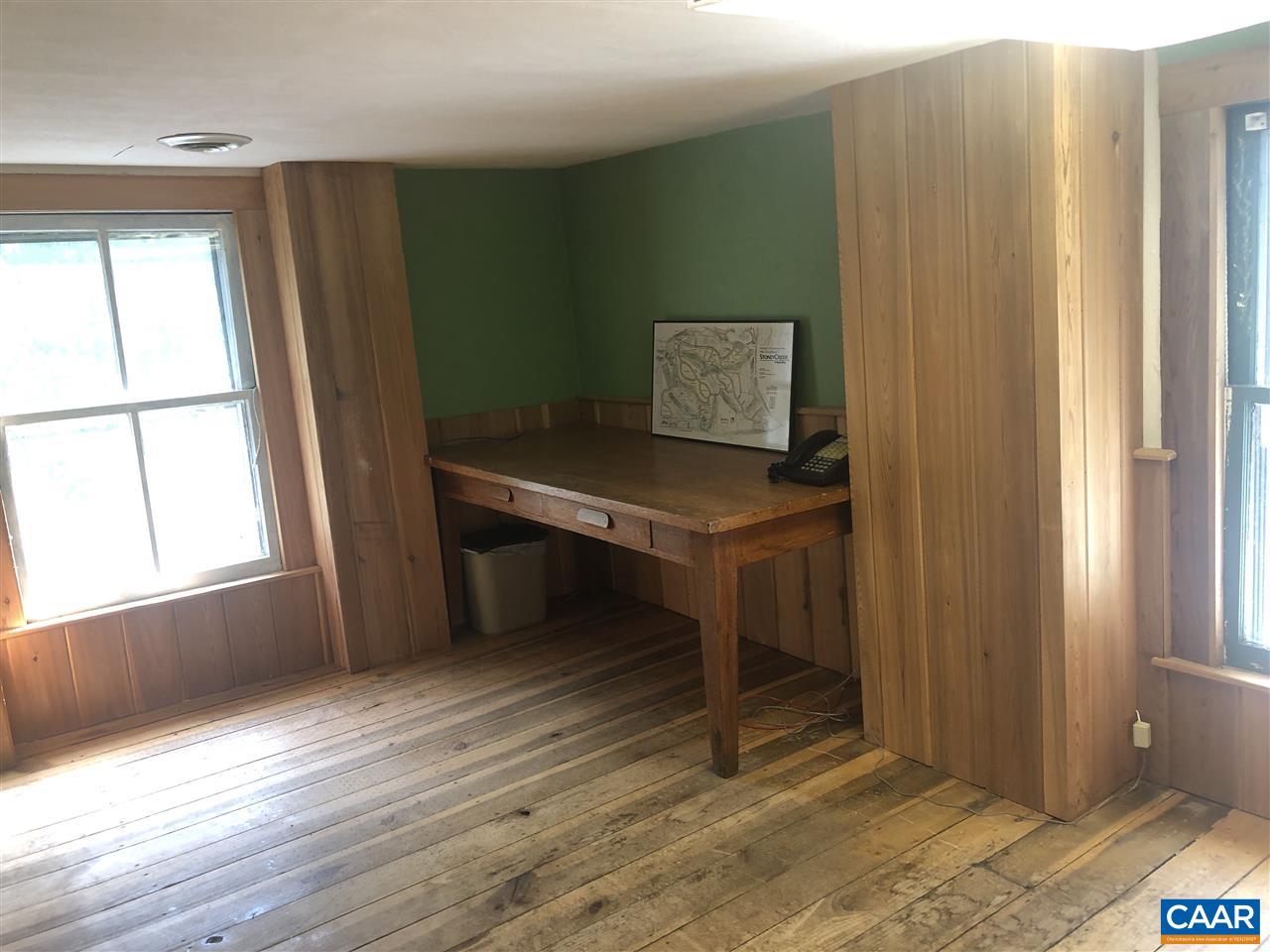 2771 Beech Grove Road Roseland, VA 22967 - Photo 21 of 31 a view of a workspace with furniture and a window