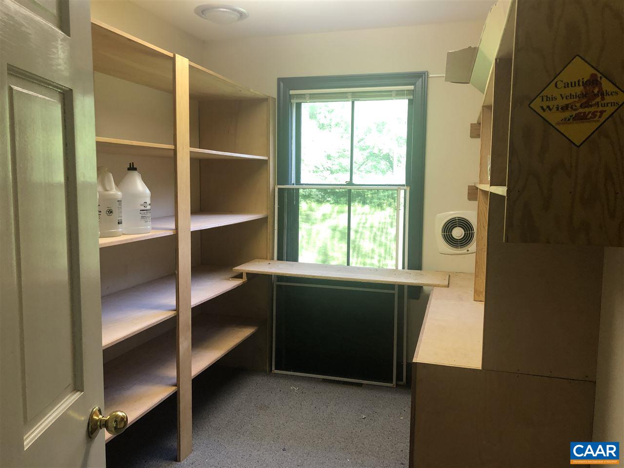 2771 Beech Grove Road Roseland, VA 22967 - Photo 26 of 31 a room with a chair and a window