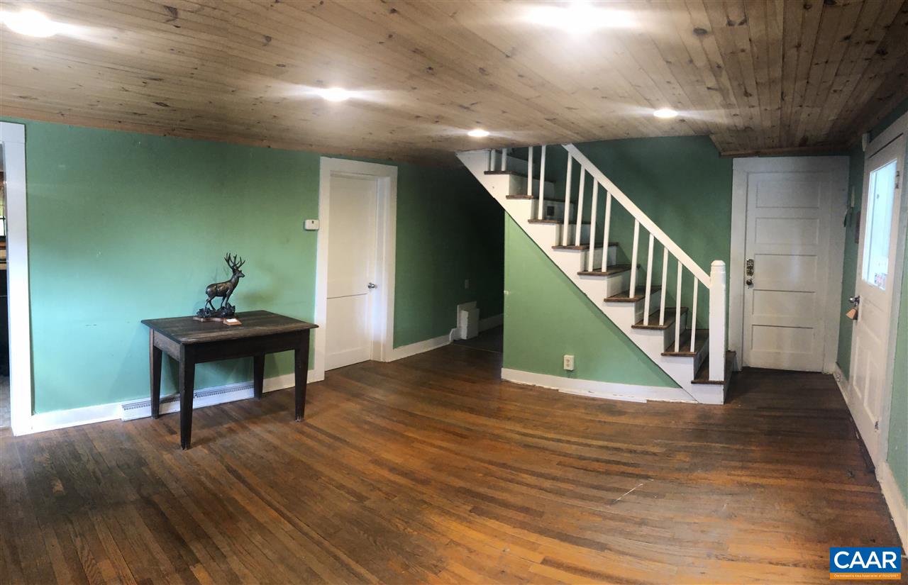 2771 Beech Grove Road Roseland, VA 22967 - Photo 3 of 31 a view of a livingroom with wooden floor and furniture
