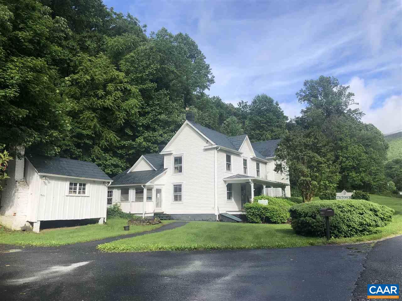 2771 Beech Grove Road Roseland, VA 22967 - Photo 31 of 31 a front view of a house with a yard and garage