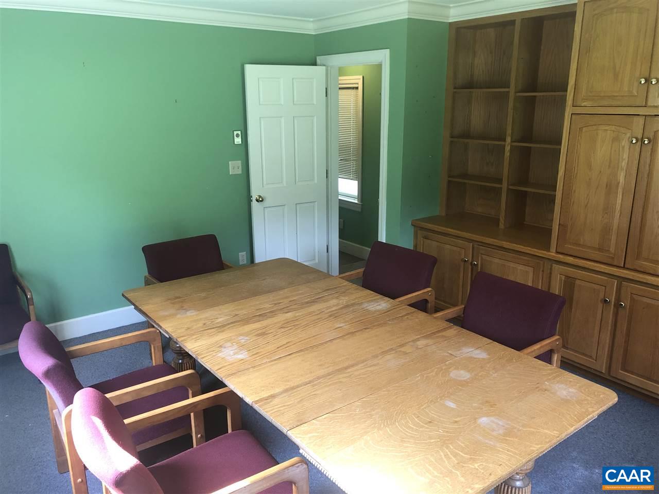 2771 Beech Grove Road Roseland, VA 22967 - Photo 9 of 31 a bedroom with a bed and a refrigerator