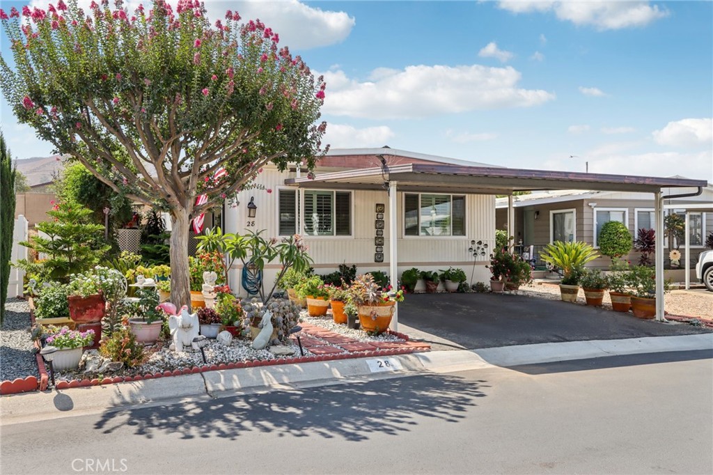 3700 Buchanan Street, Unit 28 Riverside, CA 92503 - Photo 1 of 35 a front view of a house with patio