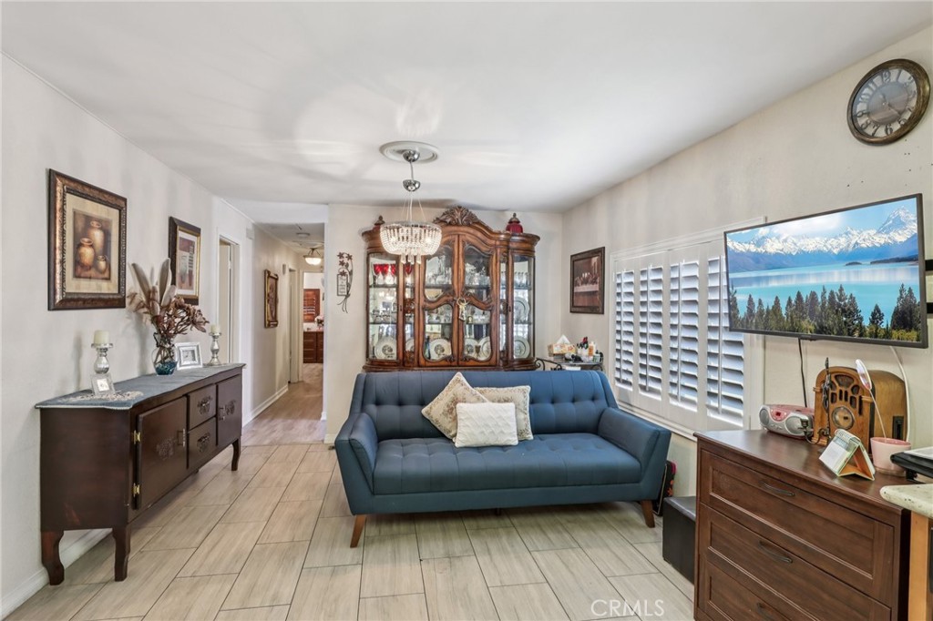 3700 Buchanan Street, Unit 28 Riverside, CA 92503 - Photo 11 of 35 a living room with furniture and view of kitchen