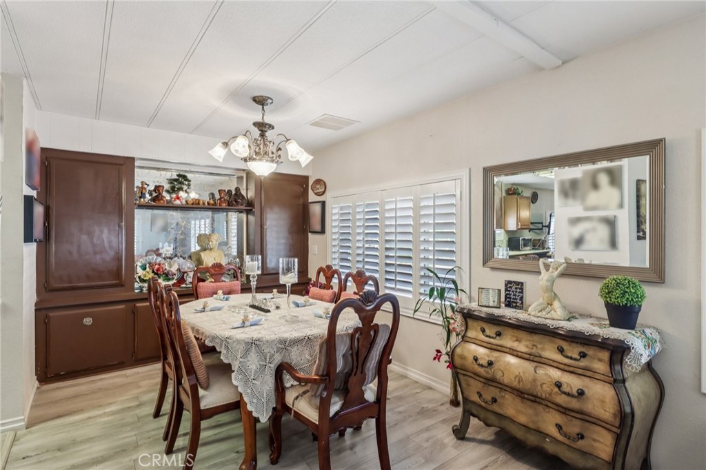 3700 Buchanan Street, Unit 28 Riverside, CA 92503 - Photo 13 of 35 a dining room with furniture and window