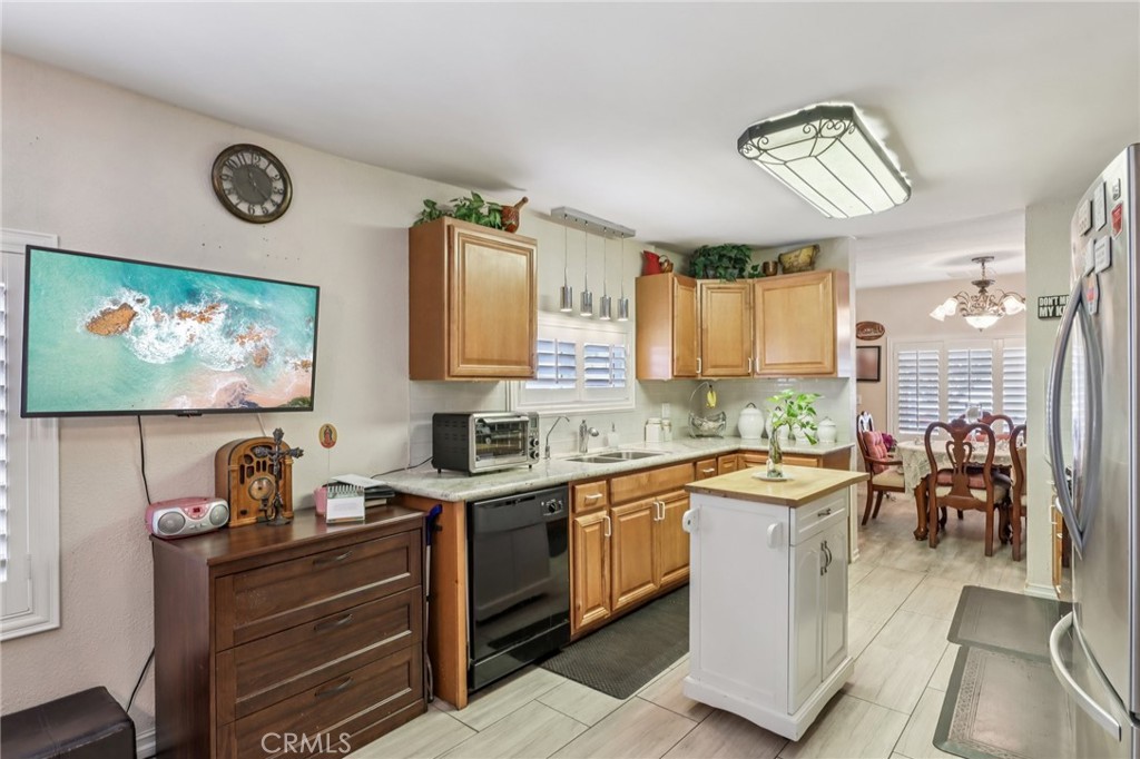 3700 Buchanan Street, Unit 28 Riverside, CA 92503 - Photo 15 of 35 a kitchen with a sink cabinets and window