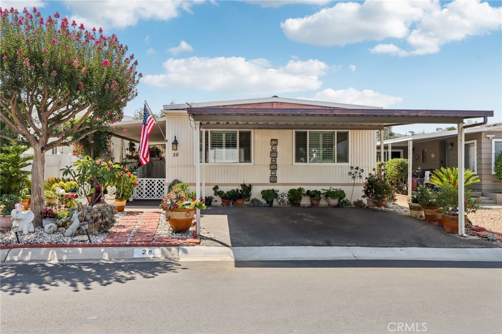 3700 Buchanan Street, Unit 28 Riverside, CA 92503 - Photo 2 of 35 a front view of a house with patio