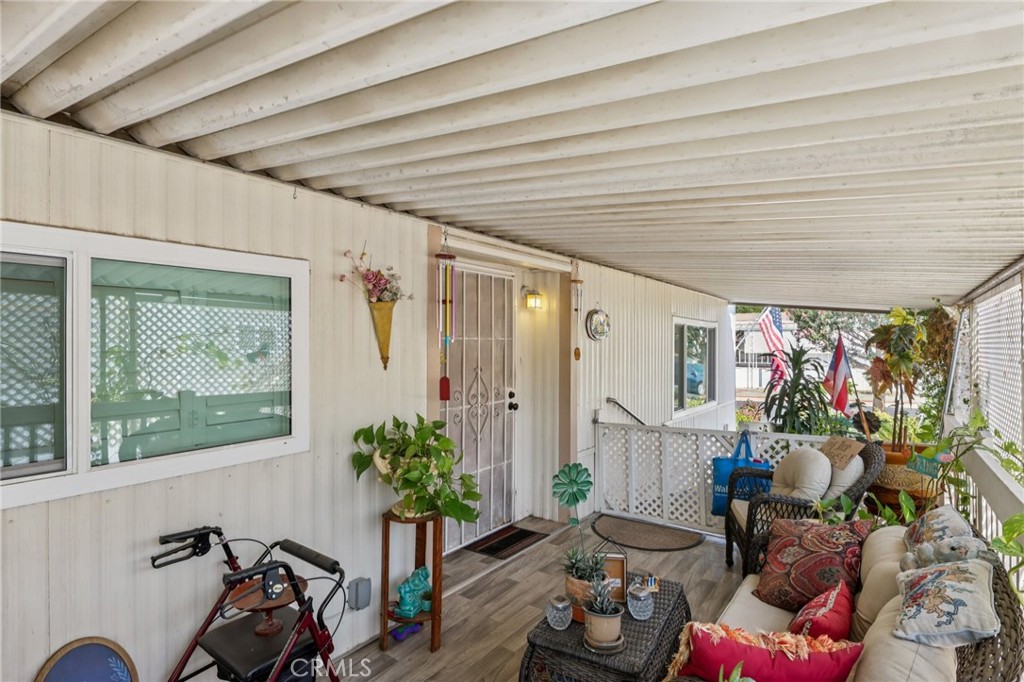 3700 Buchanan Street, Unit 28 Riverside, CA 92503 - Photo 34 of 35 a room with furniture and a potted plant