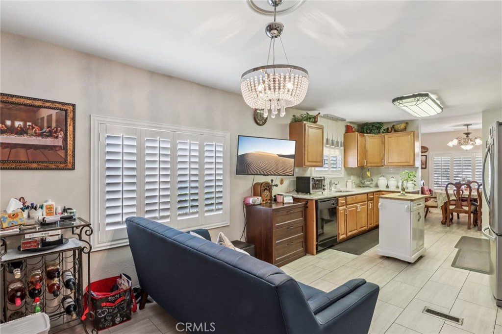 3700 Buchanan Street, Unit 28 Riverside, CA 92503 - Photo 8 of 35 a very nice looking room with many windows