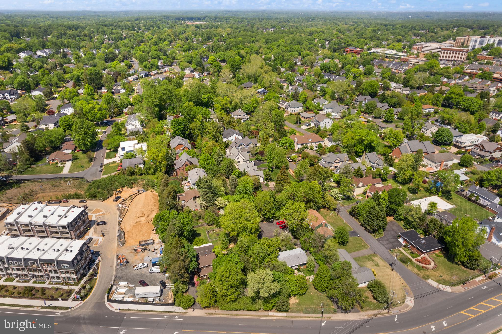 1616 Chain Bridge Road McLean, VA 22101 - Photo 25 of 28 an aerial view of residential houses with outdoor space and trees